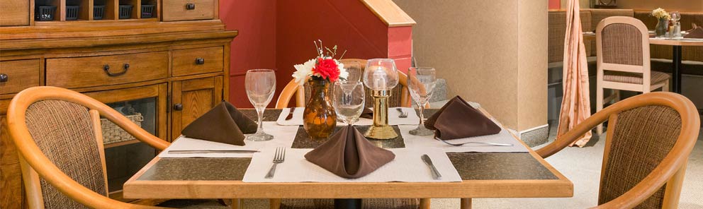 A table in the lounge of the Days Inn Stephenville hotel